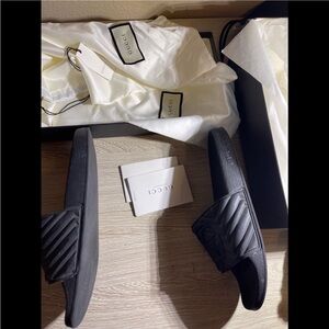 Gucci quilted slides